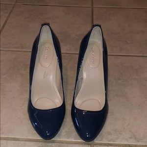 Blue Calvin Klein pumps